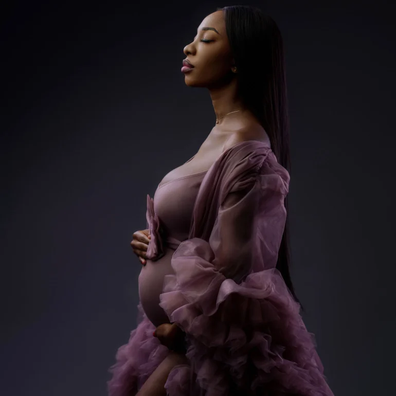 Maternity Photoshoot in North West London 71 Soft mauve gown with layered tulle; graceful profile; subtle light.