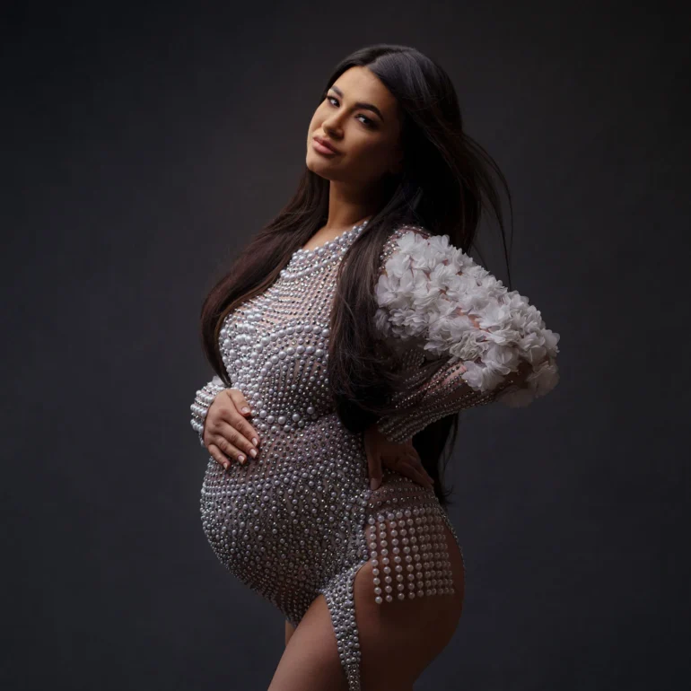 Maternity Photoshoot in North West London 72 Pearl‑embellished bodysuit with floral sleeves; refined stance.